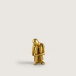 OTURAN ADAM KİTAP TUTUCU GOLD